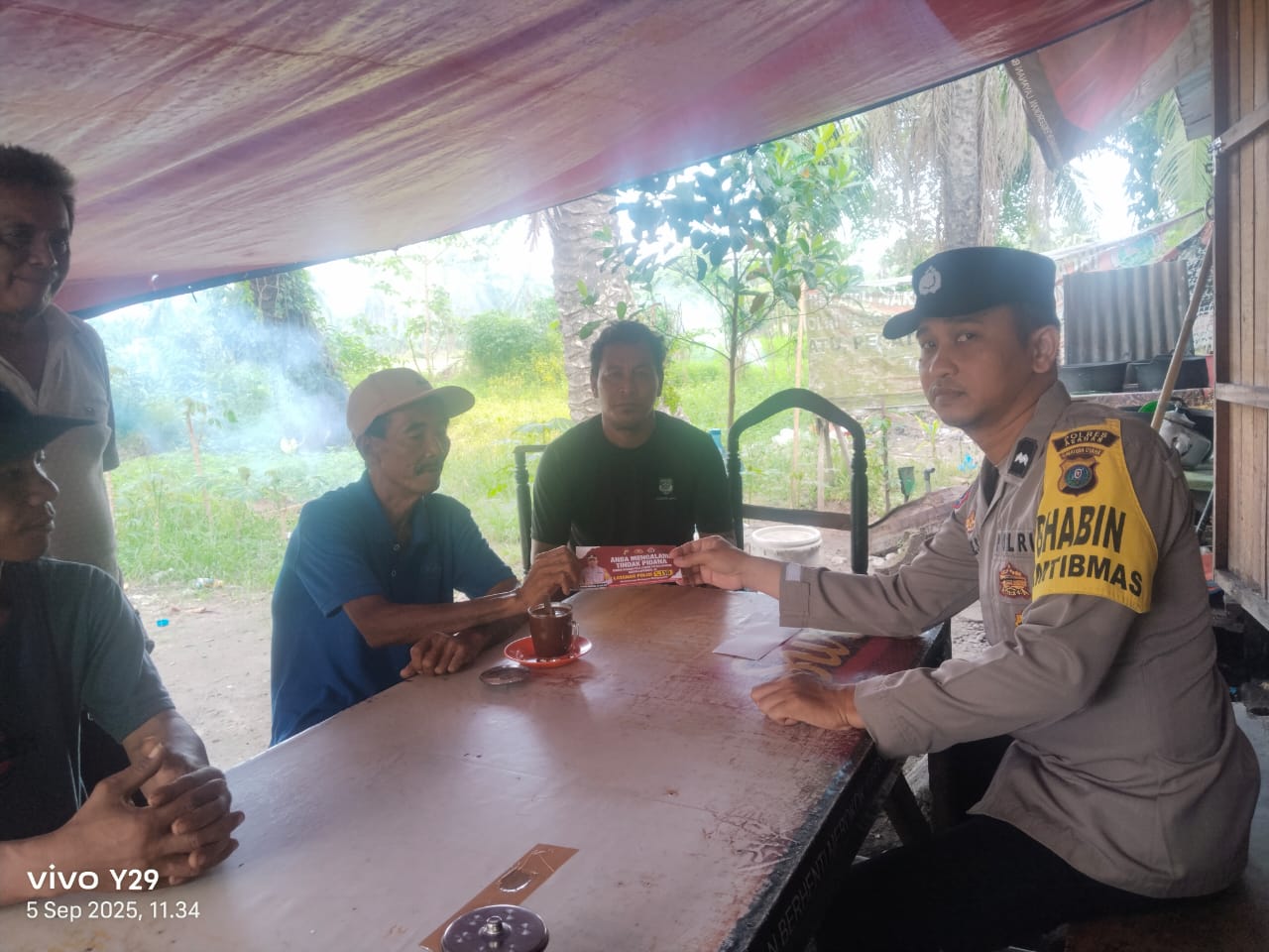 BHABINKAMTIBMAS POLSEK KOTA KISARAN SOSIALISASIKAN LAYANAN CALL CENTRE 110 KEPADA MASYARAKAT